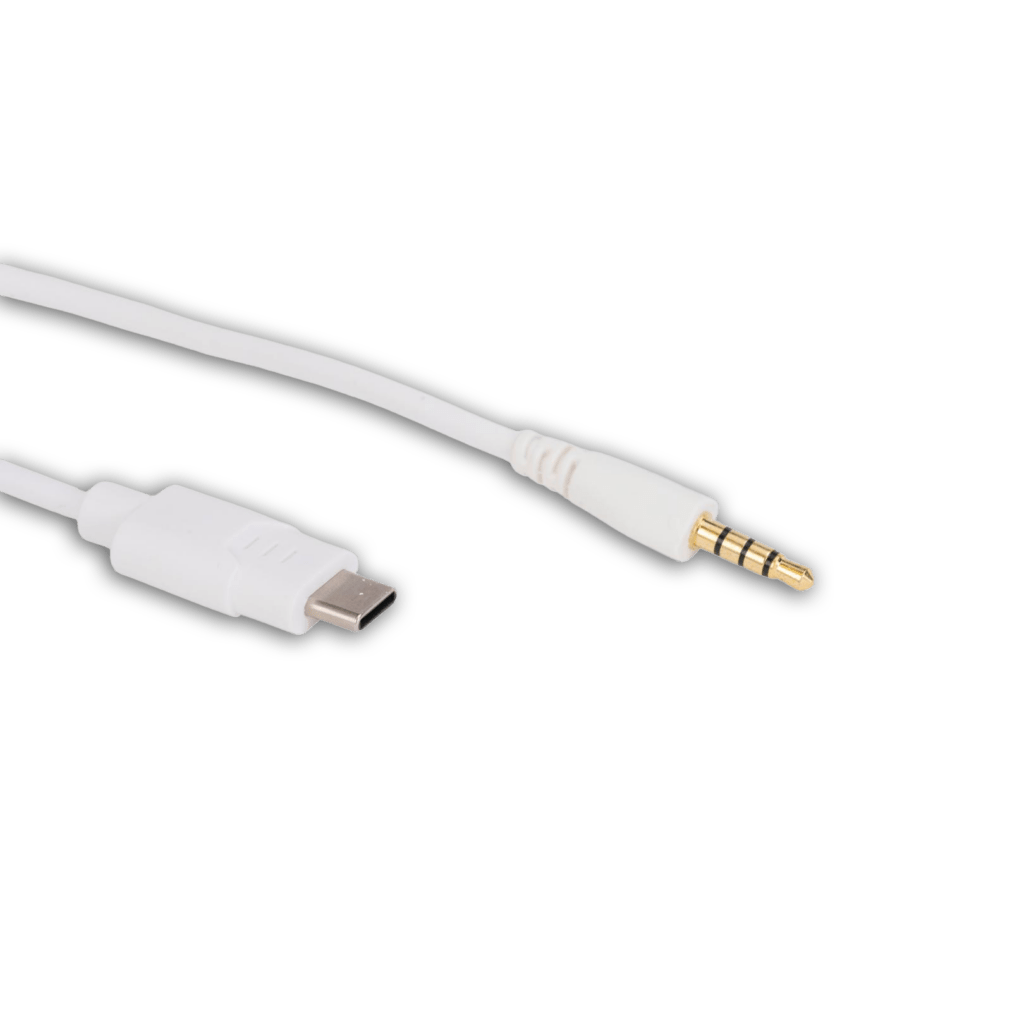 The USB-C Audio Cable (K6m, BKm) is a white cable with a USB-C connector and a gold-plated 3.5mm audio jack, designed for use with SchoolPHONES® or other kids’ headphones, shown on a plain white background.