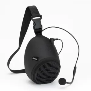 A black portable speaker with a detachable headset microphone and an adjustable shoulder strap, designed for hands-free voice amplification. The brand name “Queemmorey” appears on the front.