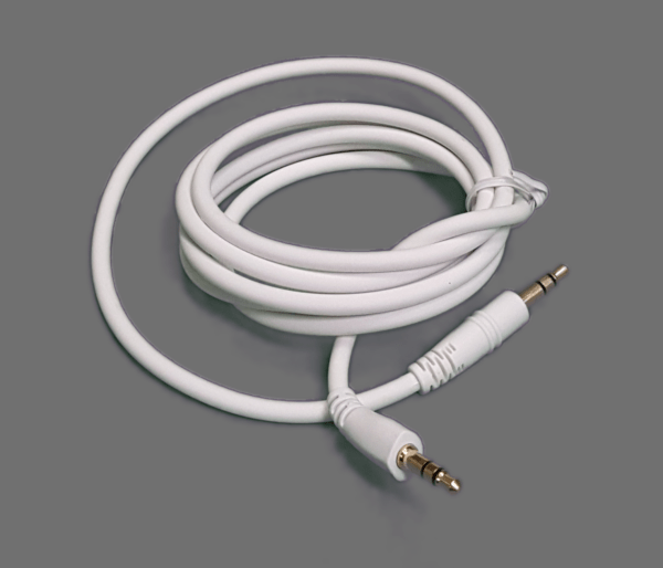 A coiled white Standard Replacement Cable for K6m & BKm Media Headset (K6m & BKm Only), featuring 3.5mm male connectors on both ends, is pictured on a plain gray background.