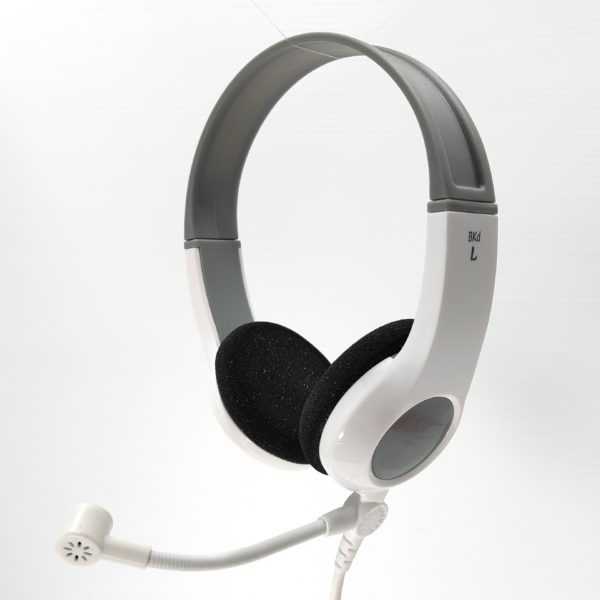 A white and gray SPD-MIC-3.5mm SchoolPHONES® headset with black cushioned ear pads and a detachable SpringBoom™ Media Microphone, pictured on a white background. Durable headphones ideal for classrooms or home learning.